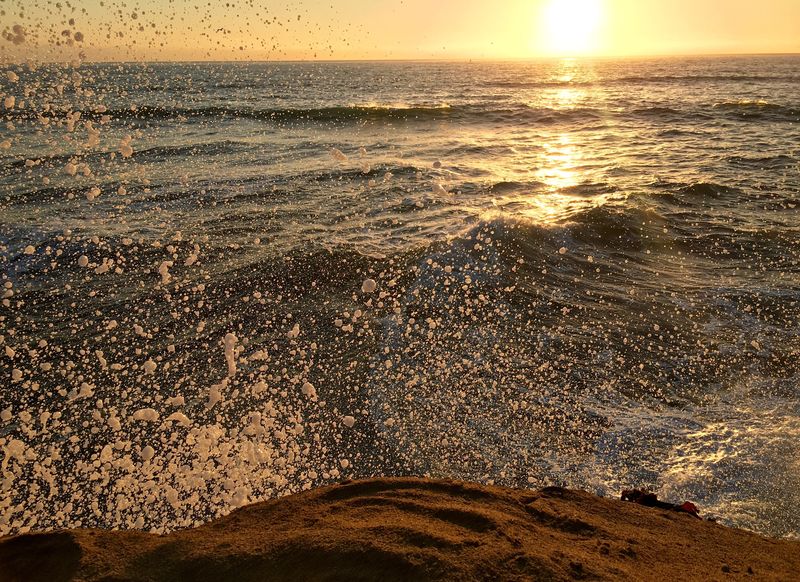 Waves breaking at sunset on the San Diego coast